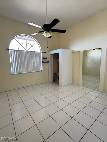 a view of a livingroom with furniture window and wooden floor