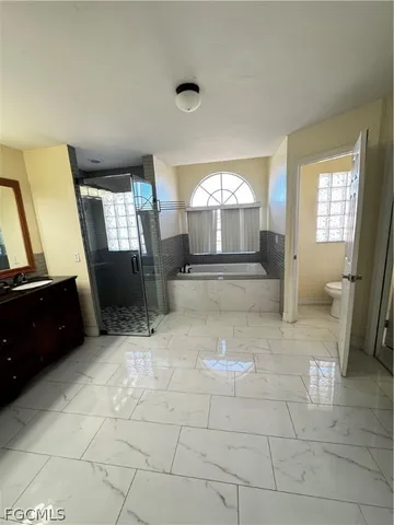 a view of front door with wooden floor