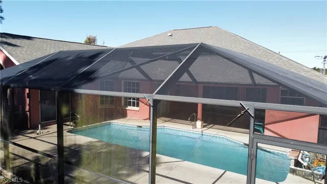 a patio with table and chairs