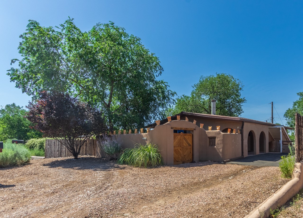 Front showing upper unit and driveway parking