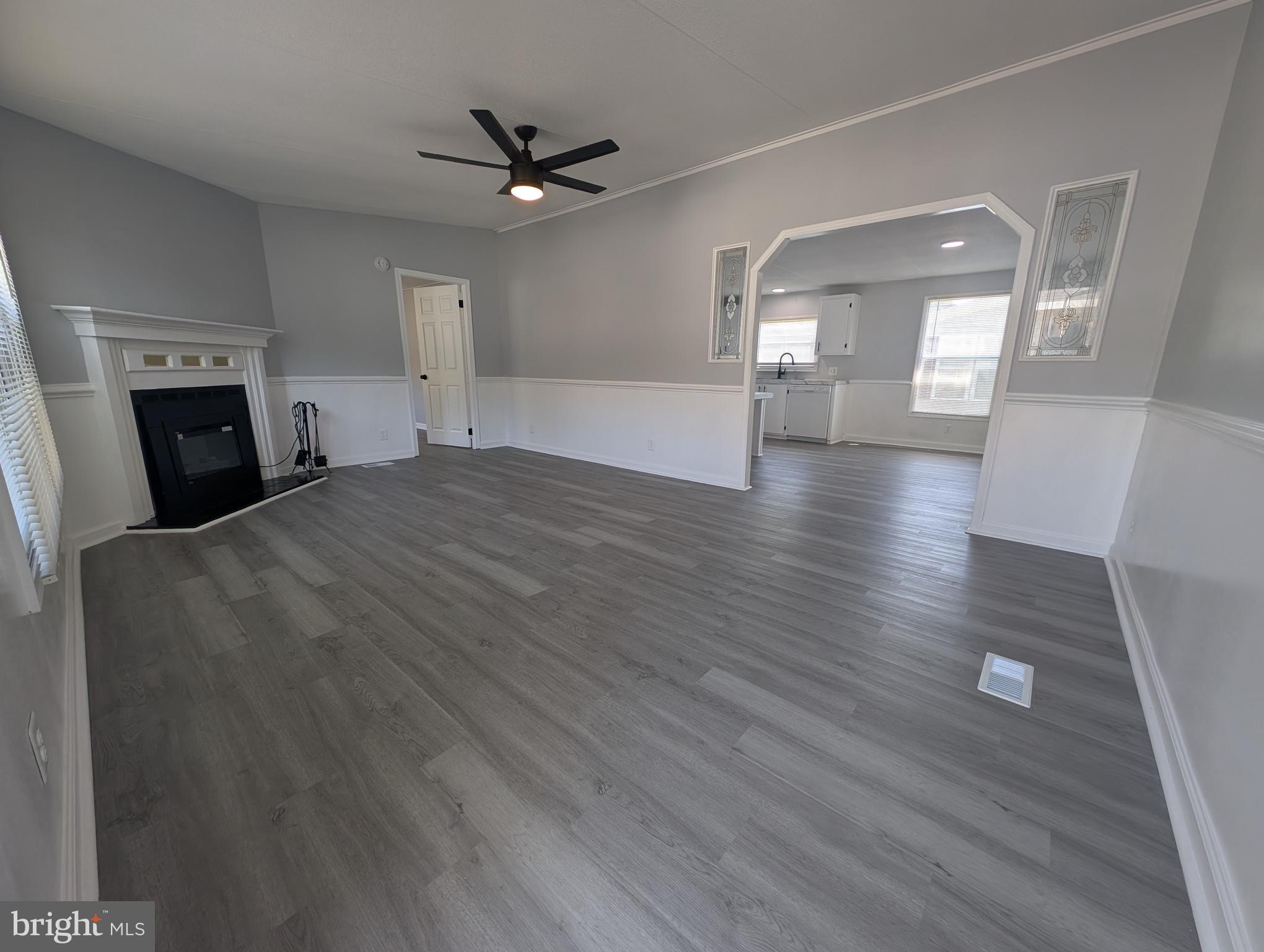 213 Poclain Road Aberdeen, MD 21001 - Photo 1 of 12 a view of empty room with wooden floor