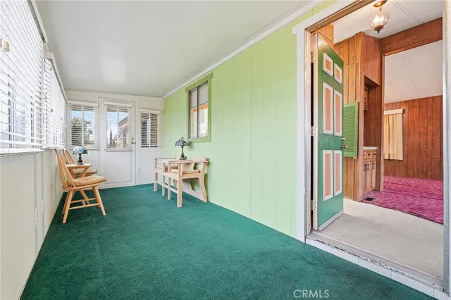 a living room with furniture and a gate