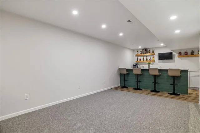 a view of storage and utility room with two washing machine