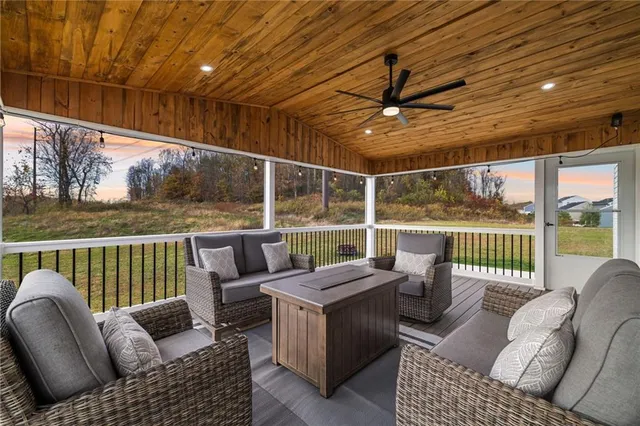 a outdoor living space with furniture and garden view