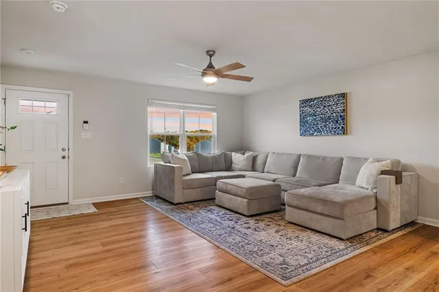 a living room with couches and a coffee table
