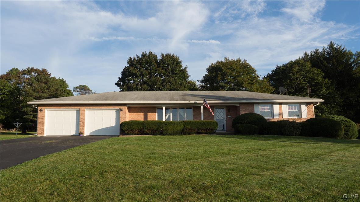front view of house with a yard