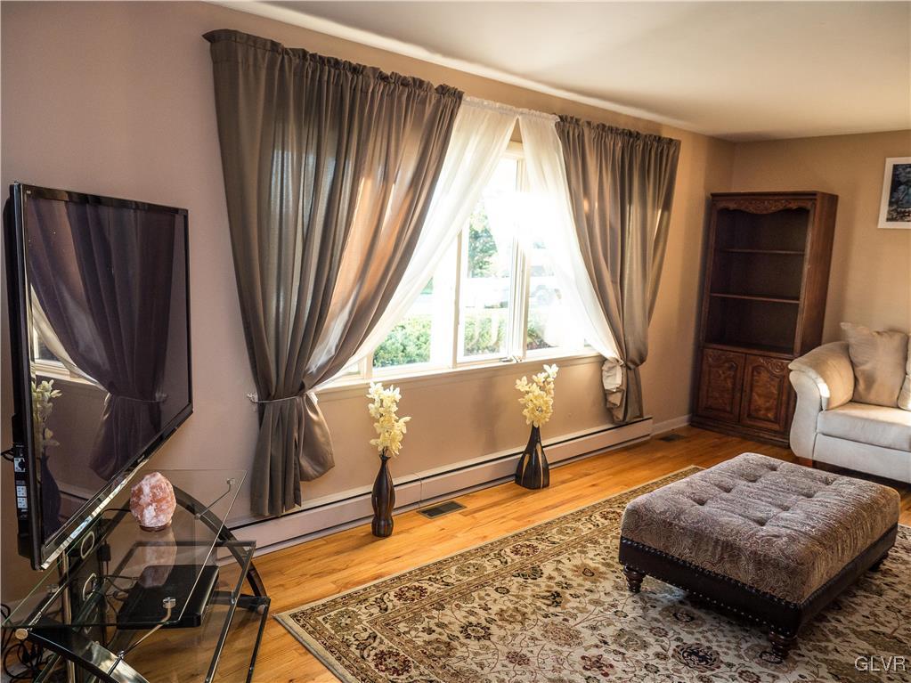 948 Engler Road Nazareth, PA 18064 - Photo 4 of 38 a living room with a couch and a window