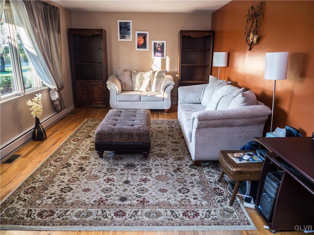 948 Engler Road Nazareth, PA 18064 - Photo 5 of 38 a living room with furniture and a rug