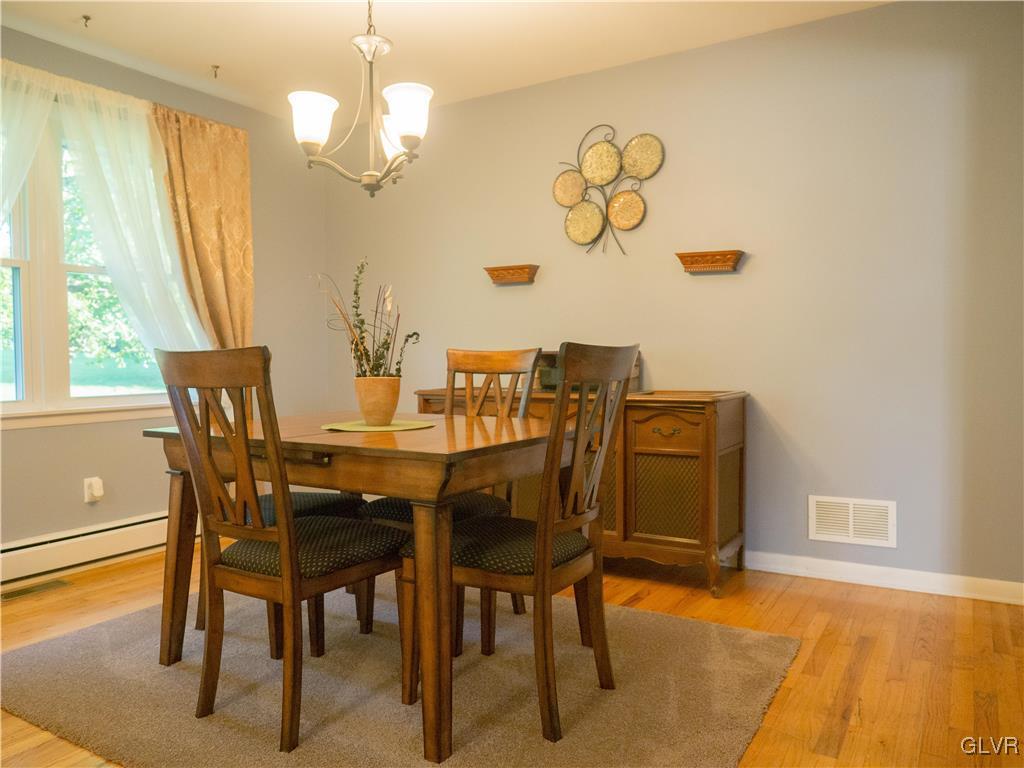 948 Engler Road Nazareth, PA 18064 - Photo 10 of 38 a view of a dining room with furniture and a chandelier