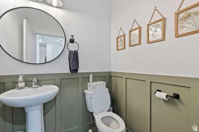 1323 South Raintree Lane Santaquin, UT 84655 - Photo 8 of 23 Bathroom with a decorative wall and a wainscoted wall