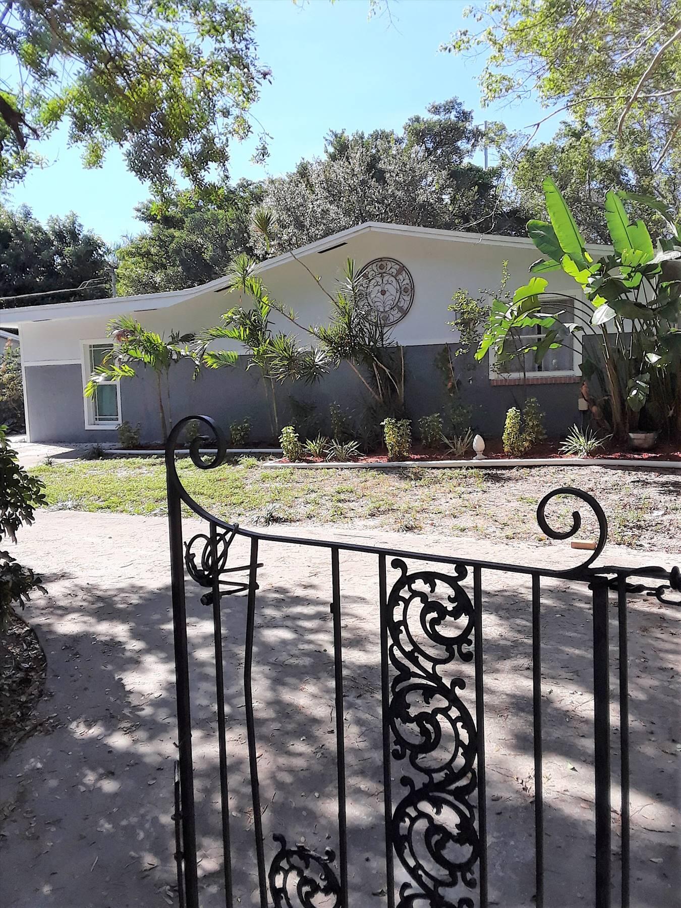 2811 Lyons Road Coconut Creek, FL 33063 - Photo 1 of 36 Gate Entrance
