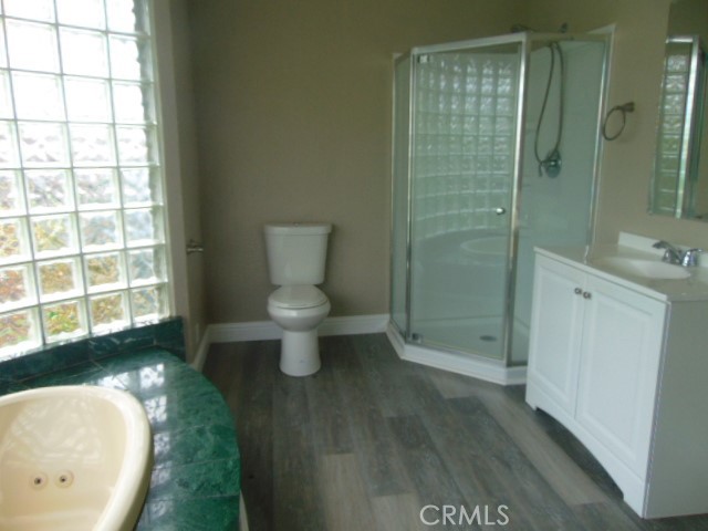 1359 2nd Street Red Bluff, CA 96080 - Photo 7 of 12 a bathroom with a sink and a mirror