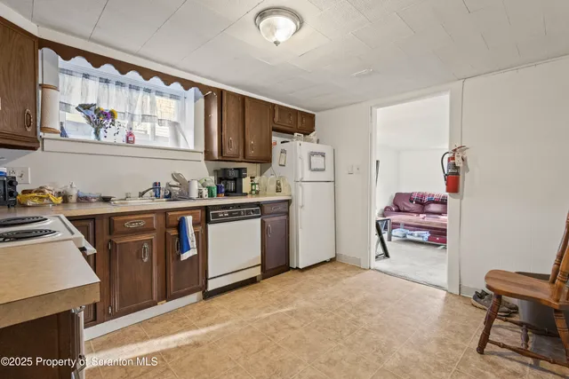 a bedroom with a bed and a closet