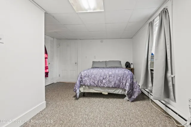 a bathroom with a sink and toilet