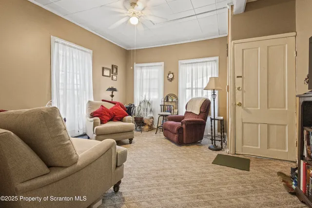 a living room with furniture and a window