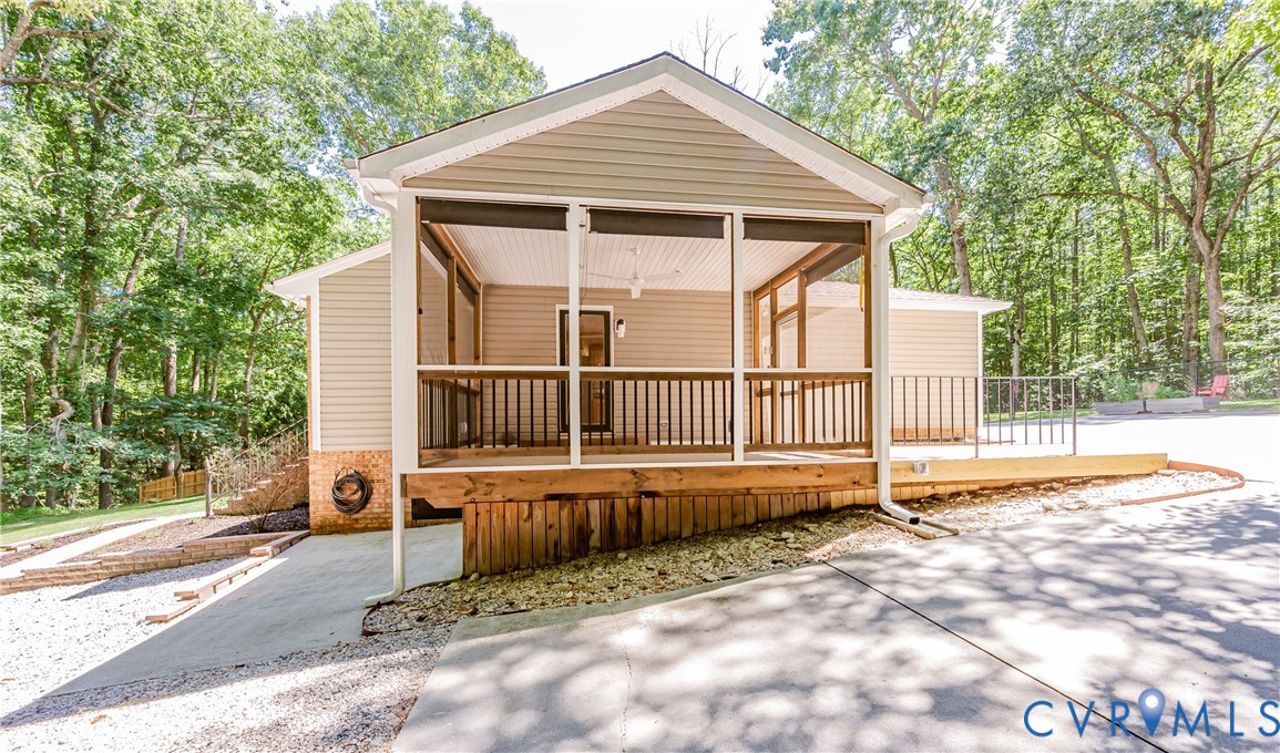 16110 Rowlett Road Chesterfield, VA 23838 - Photo 2 of 23 Side entry with screened in porch