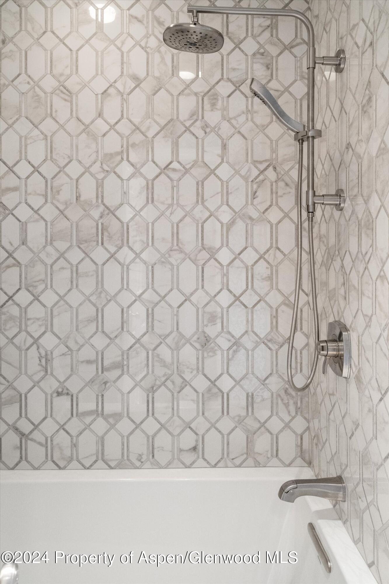 407 Gateway Road Snowmass, CO 81654 - Photo 28 of 37 a bathroom with a white wall
