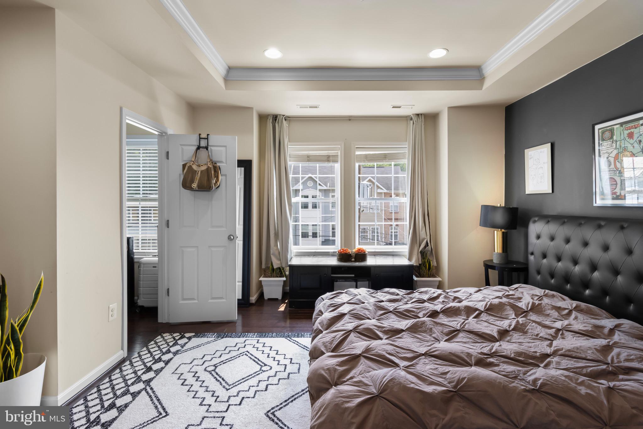 1778 W Street Southeast Washington, DC 20020 - Photo 21 of 44 a bedroom with a bed and a window
