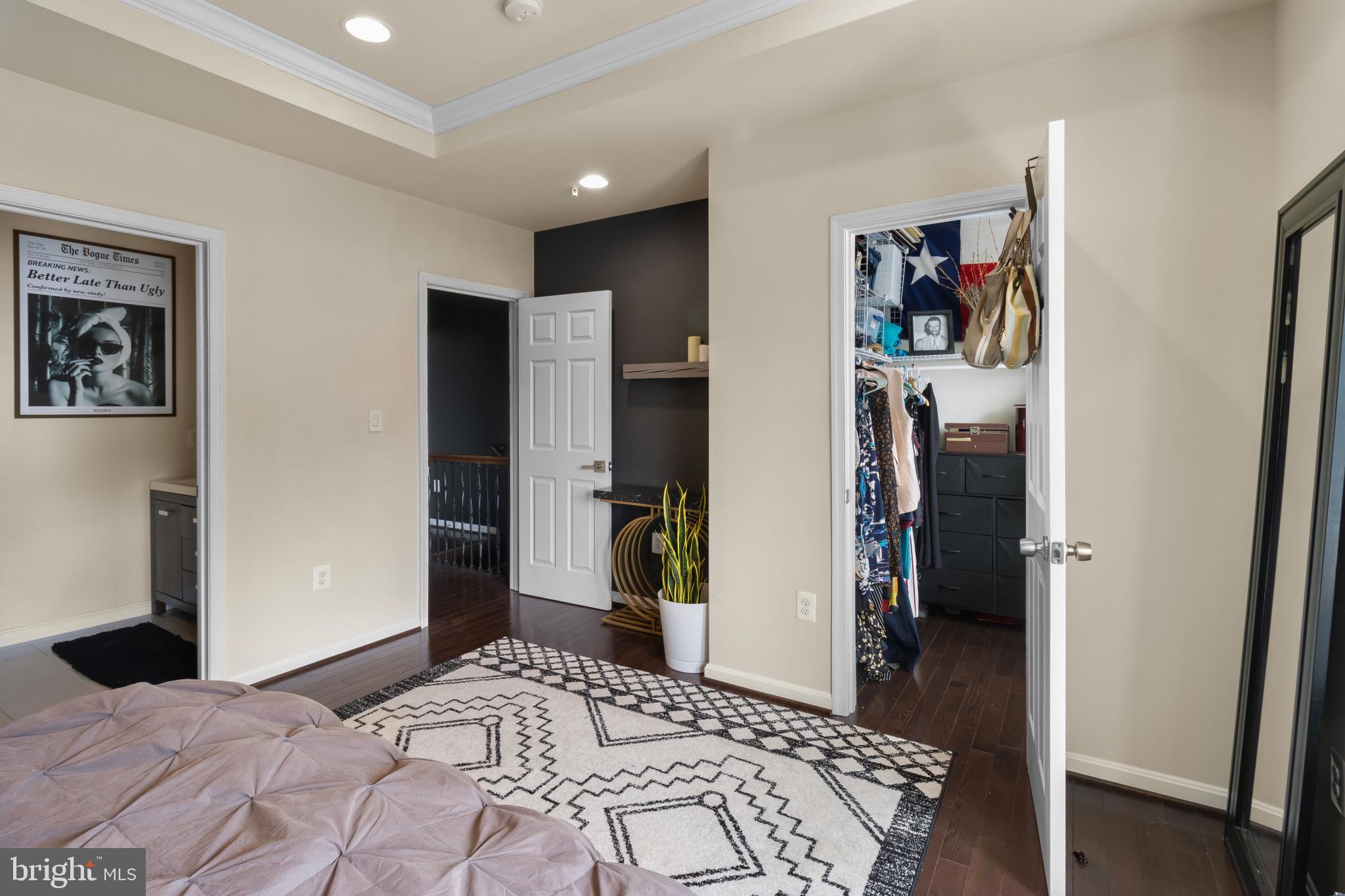 1778 W Street Southeast Washington, DC 20020 - Photo 22 of 44 a bedroom with a bed and a walk in closet