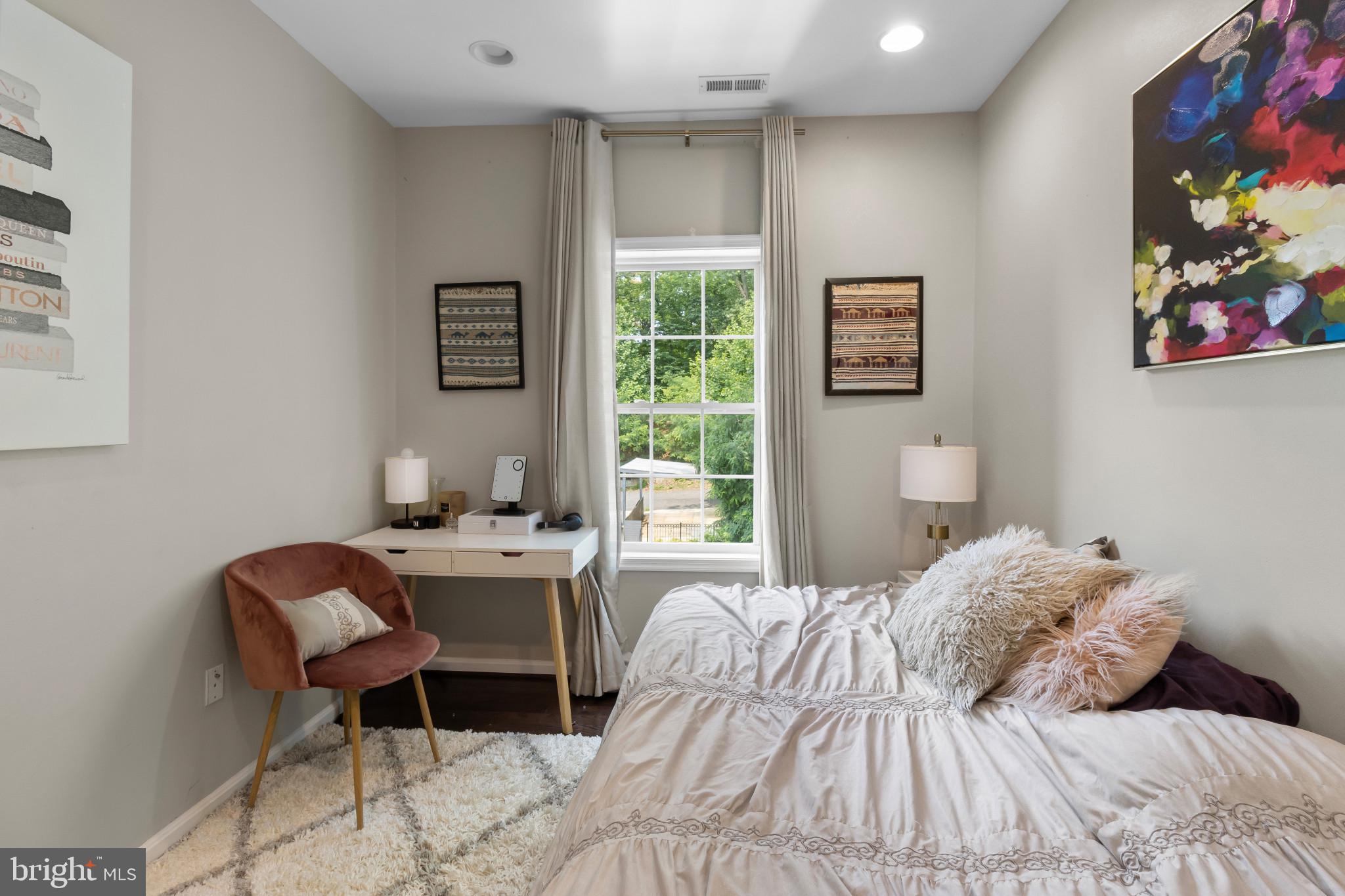 1778 W Street Southeast Washington, DC 20020 - Photo 32 of 44 a bedroom with a bed and a window