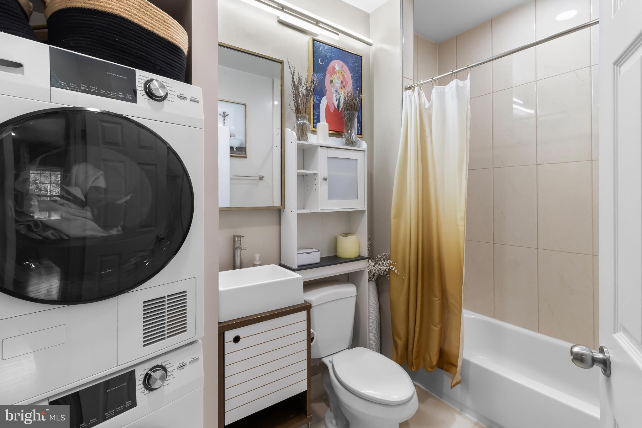 1778 W Street Southeast Washington, DC 20020 - Photo 36 of 44 a bathroom with a toilet a sink and bathtub