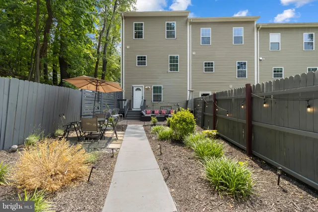 a view of swimming pool with outdoor seating