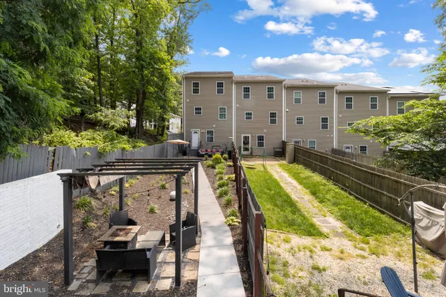 a view of a house with a street