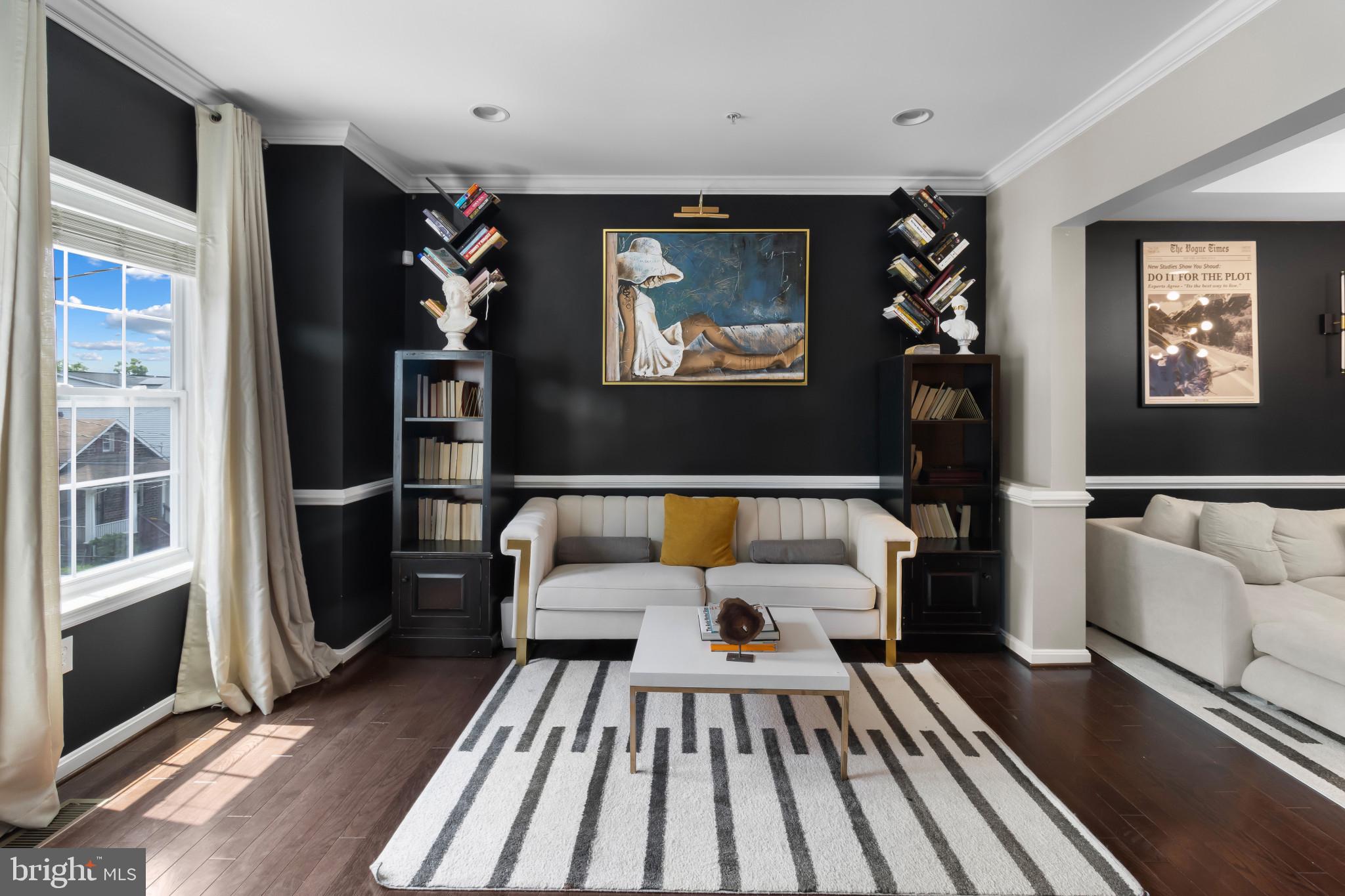 1778 W Street Southeast Washington, DC 20020 - Photo 8 of 44 a living room with furniture and a rug