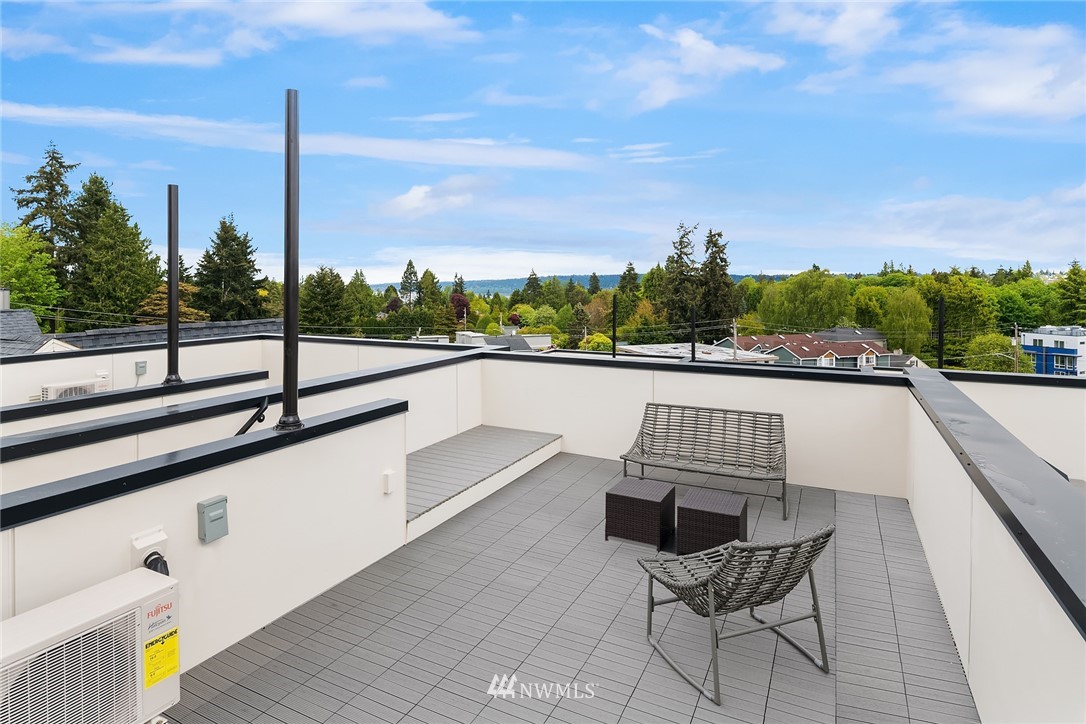 8370 Loyal Way Northwest, Unit B Seattle, WA 98117 - Photo 16 of 19 a view of swimming pool with lounge chairs