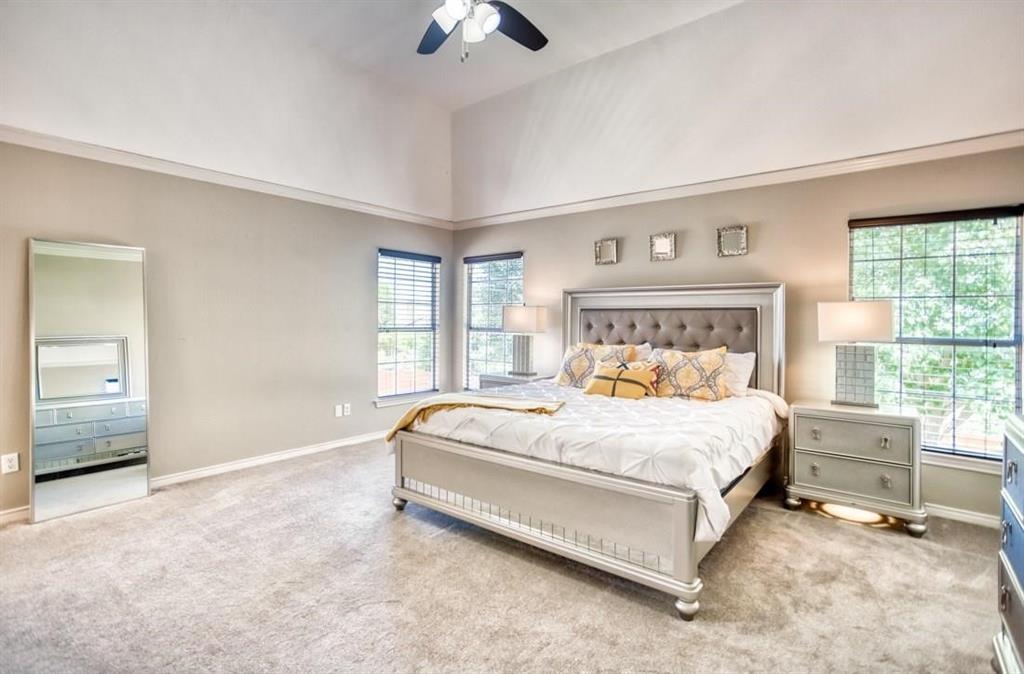 5421 North Briar Ridge Circle McKinney, TX 75072 - Photo 17 of 27 Carpeted bedroom featuring baseboards and ceiling fan