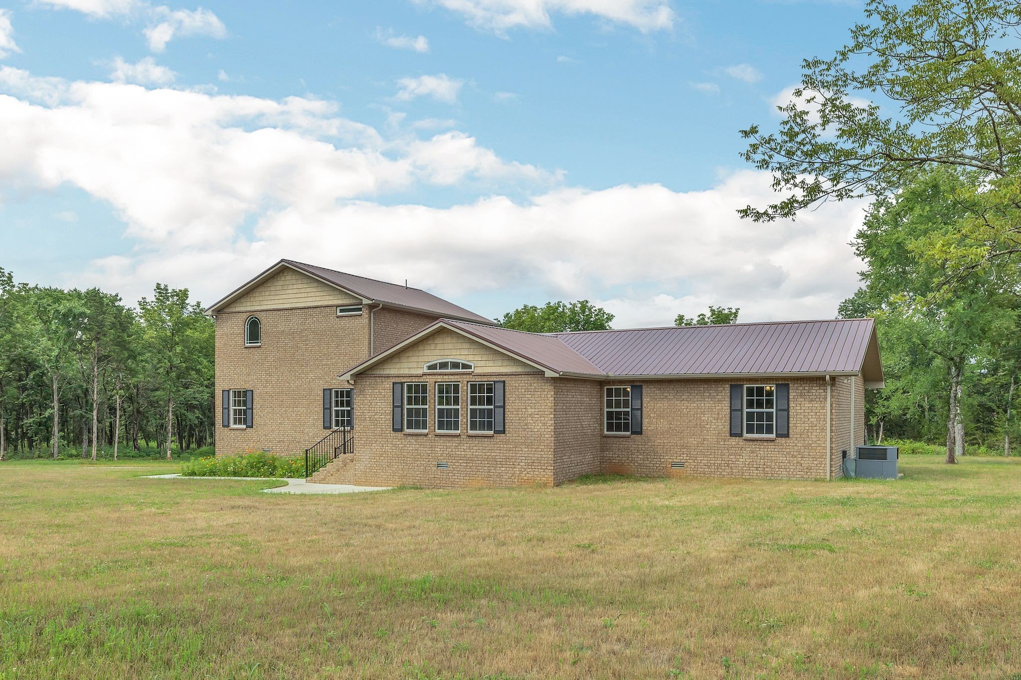 5065 Craddock Road Lascassas, TN 37085 - Photo 3 of 51 a view of a house with a backyard