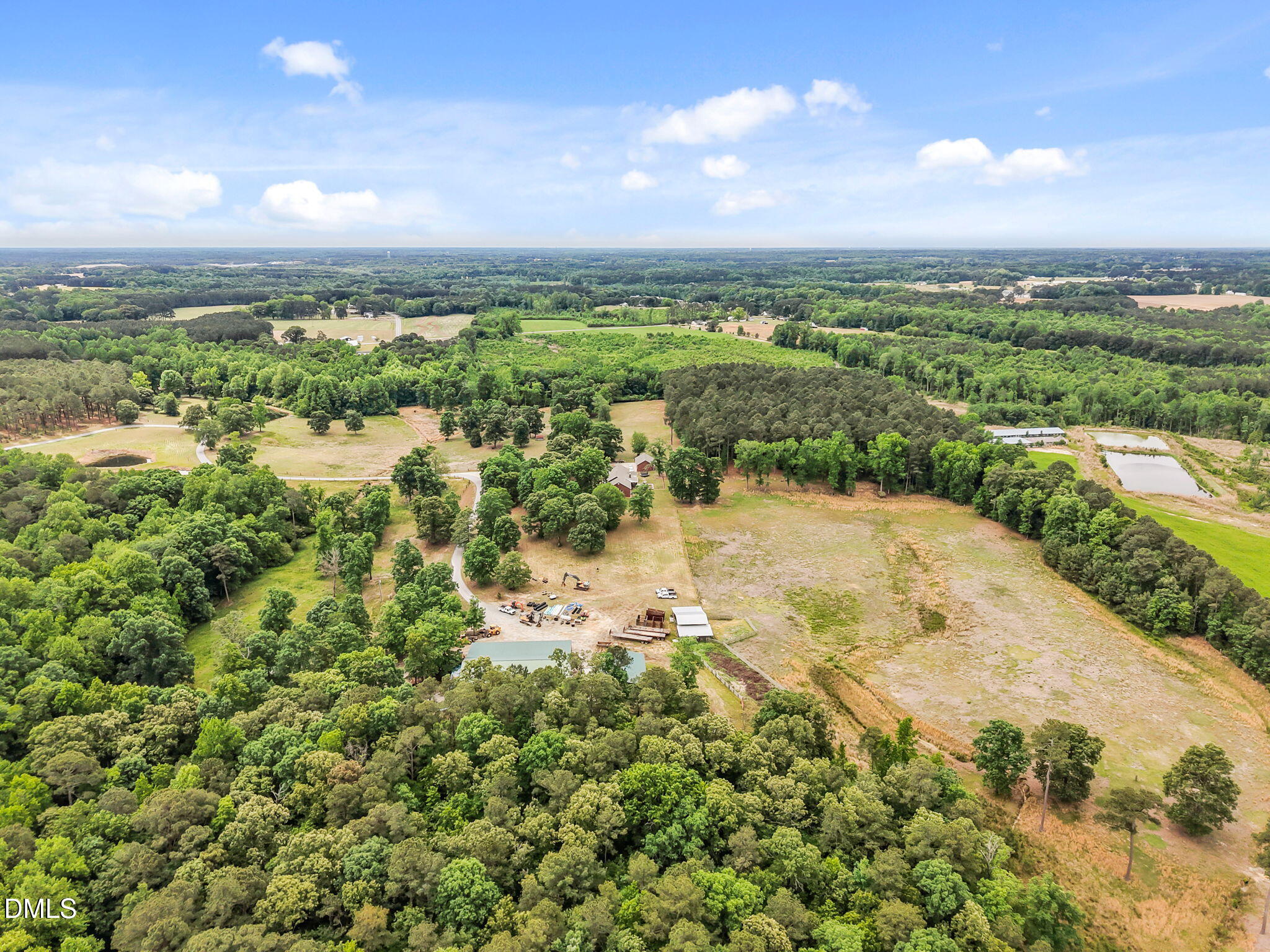 2880 Elevation Road Four Oaks, NC 27524 - Photo 47 of 51 a view of a lake with a city