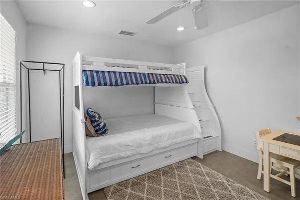 a view of storage and utility room with washer and dryer