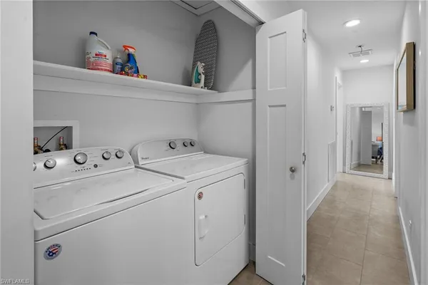 a view of balcony with furniture