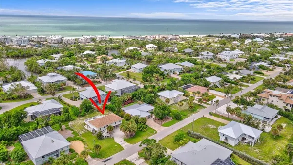 a view of a lake with a yard