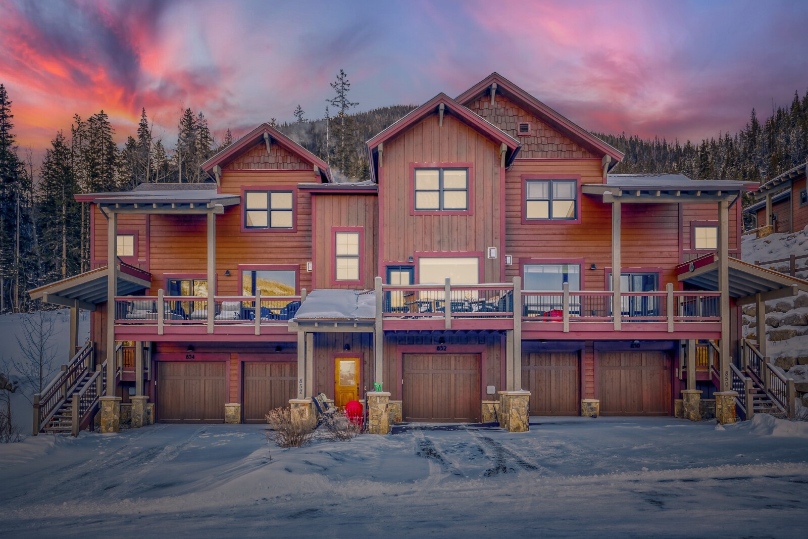 852 Independence Road, Unit B Keystone, CO 80435 - Photo 1 of 38 a view of a big house with wooden fence