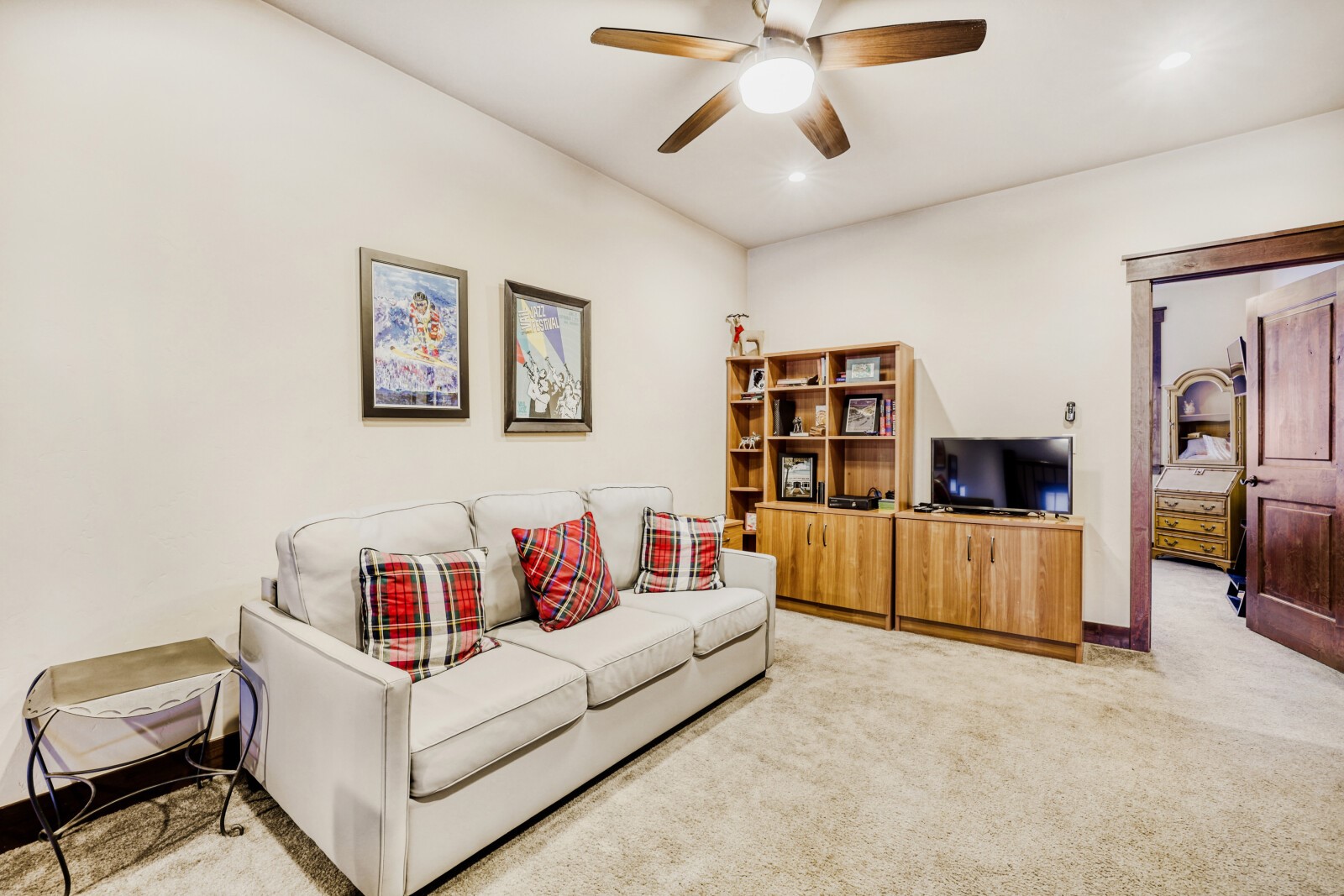 852 Independence Road, Unit B Keystone, CO 80435 - Photo 18 of 38 a living room with furniture and a flat screen tv