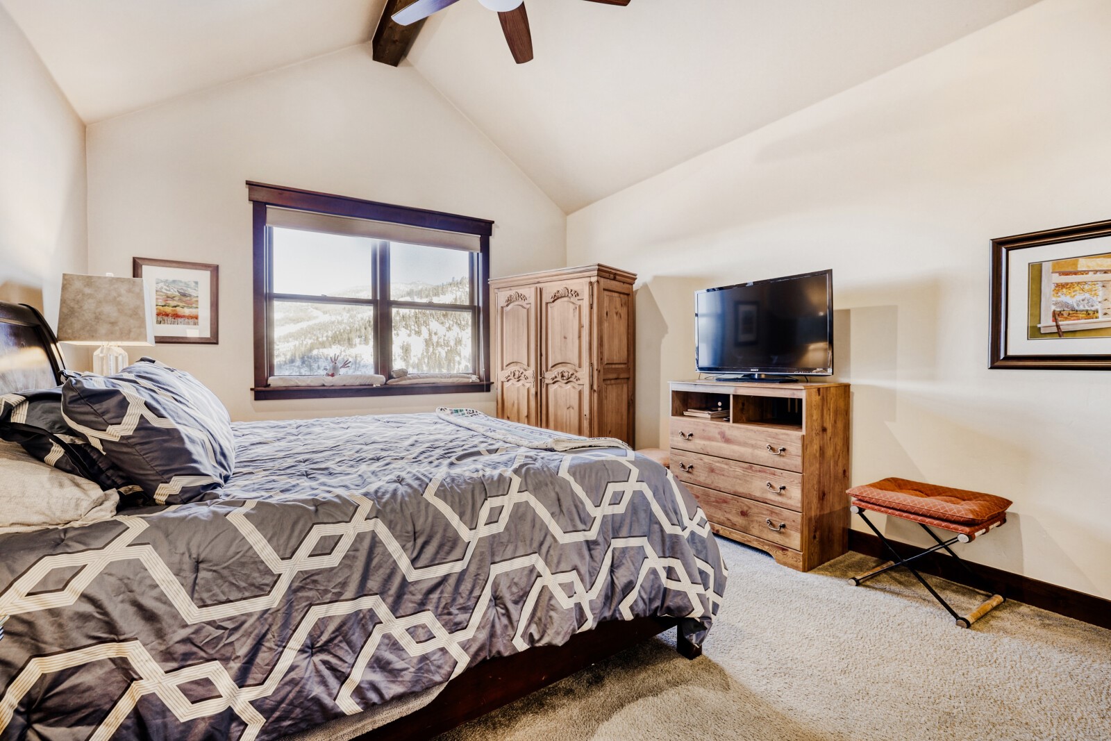 852 Independence Road, Unit B Keystone, CO 80435 - Photo 20 of 38 a bedroom with a bed and a television