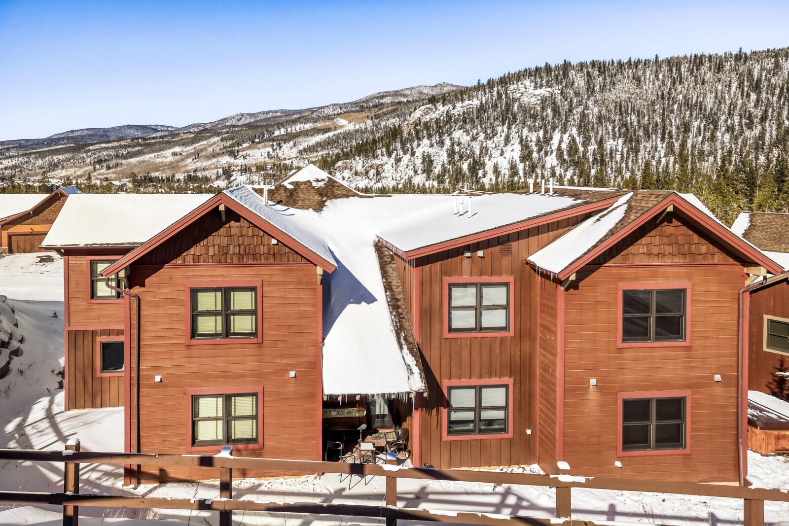 852 Independence Road, Unit B Keystone, CO 80435 - Photo 32 of 38 a front view of a house with a yard