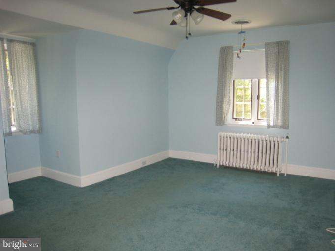 907 Old Oak Road Baltimore, MD 21212 - Photo 13 of 28 an empty room with a window