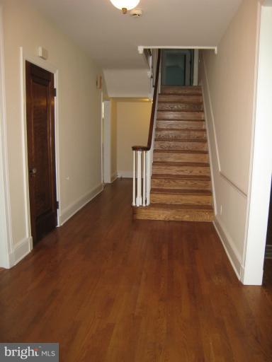 907 Old Oak Road Baltimore, MD 21212 - Photo 17 of 28 a view of a hallway with staircase