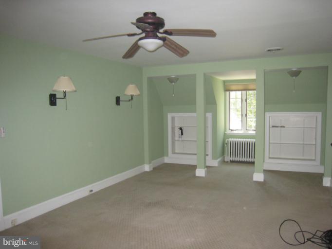 907 Old Oak Road Baltimore, MD 21212 - Photo 18 of 28 a view of a livingroom with a chandelier fan