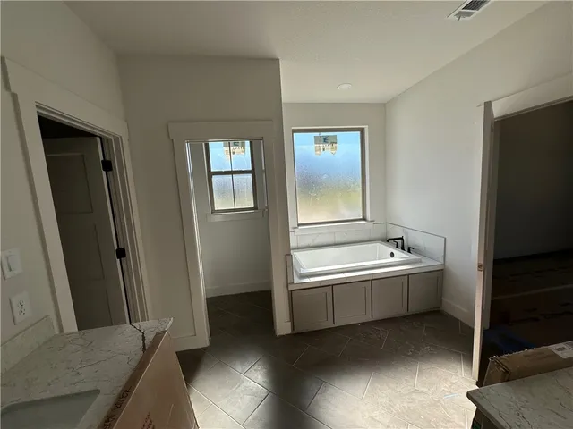 a view of a backyard of a house