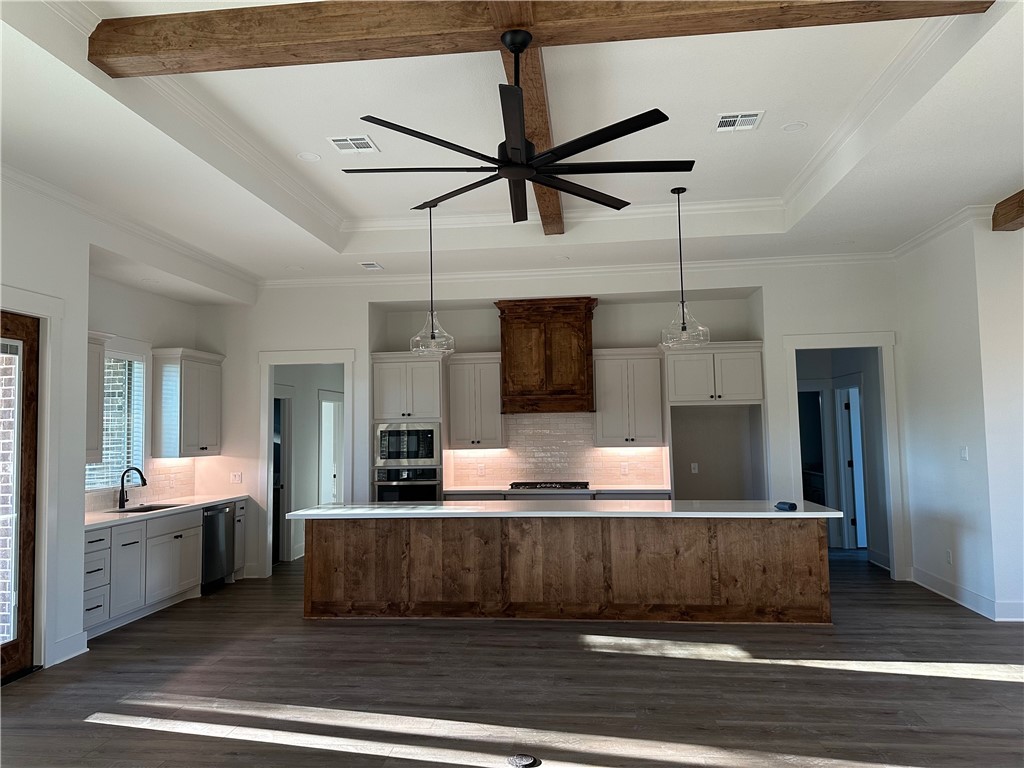10474 Whiskey River Road Bryan, TX 77808 - Photo 8 of 37 a living room with stainless steel appliances kitchen island granite countertop furniture and a view of bedroom