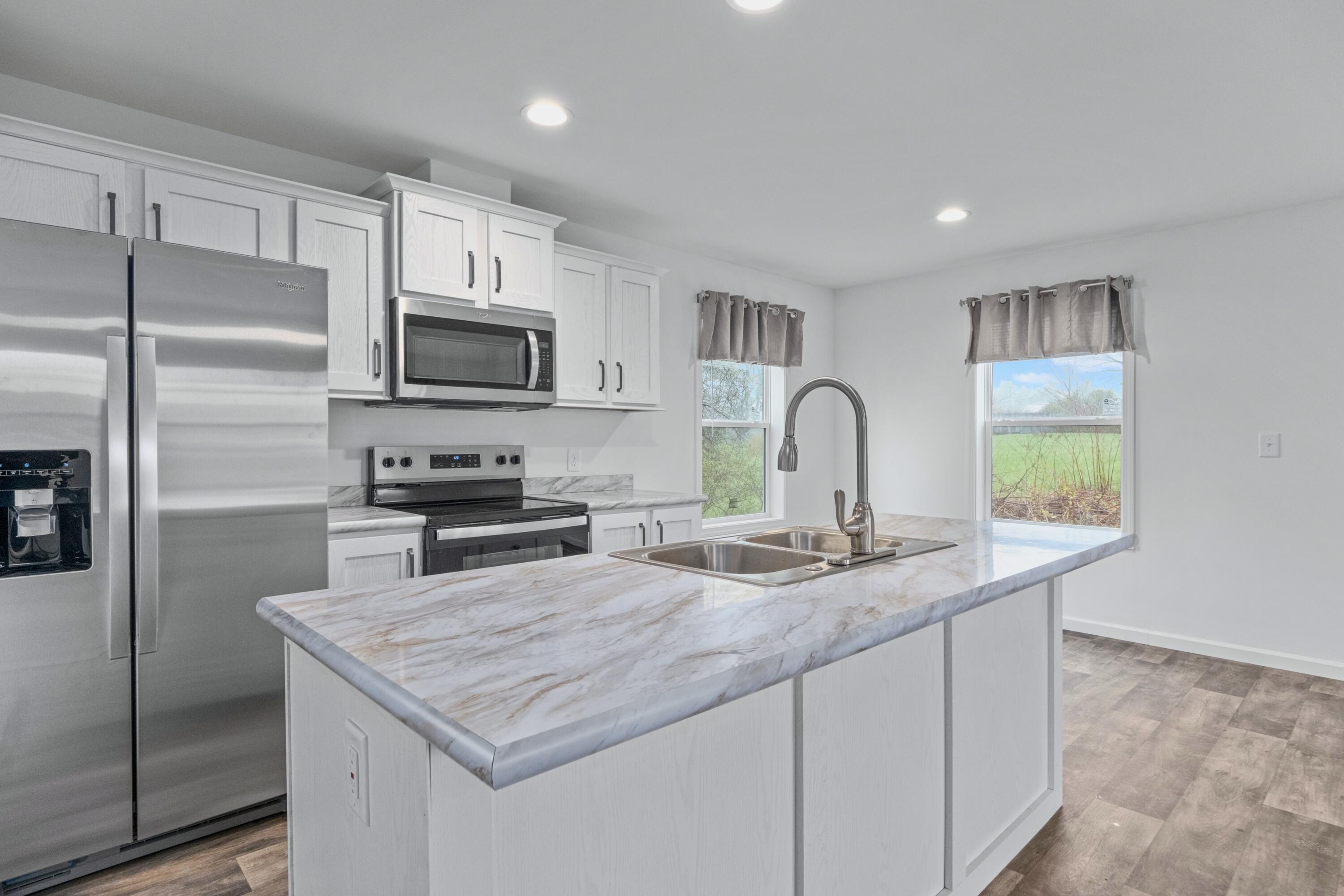 1599 Oyster River Road Warren, ME 04864 - Photo 6 of 19 Kitchen and dining area
