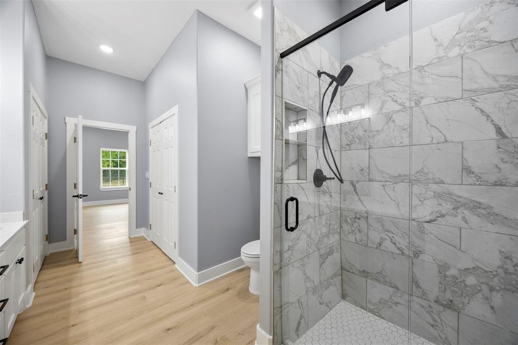 121 Brazier Road Ennis, TX 75119 - Photo 16 of 31 a bathroom with a shower