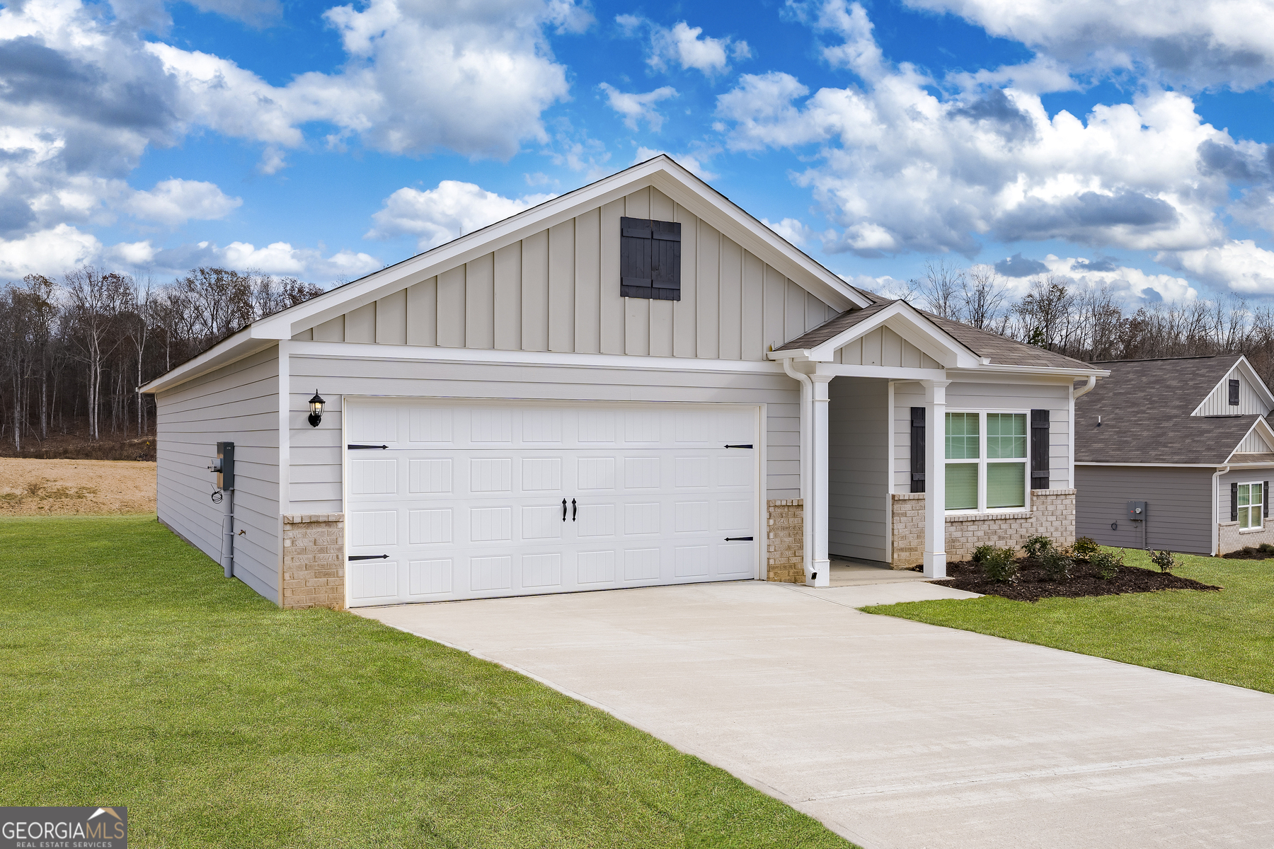 115 Darter Court Jefferson, GA 30549 - Photo 2 of 16 a view of a house with backyard and garden