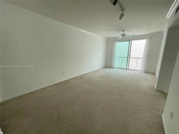 a view of a room with white walls