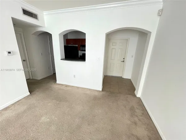 an empty room with windows