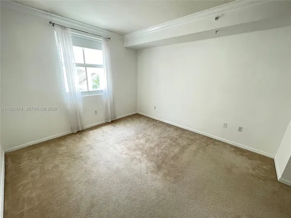a view of a hallway with a wooden floor